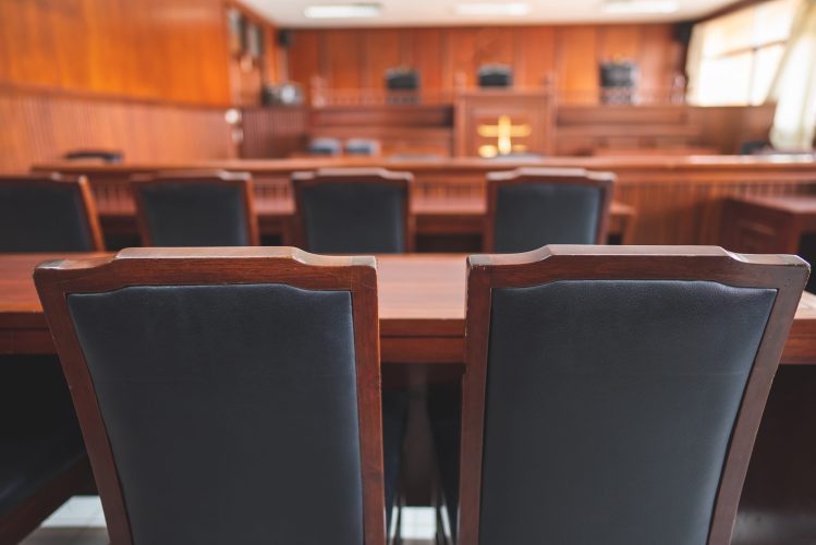 Table and chair in the courtroom of the judiciary.